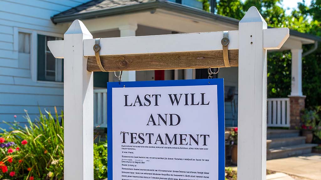 Last Will and Testament on Hanging Sign in front of Bungalow-Style home