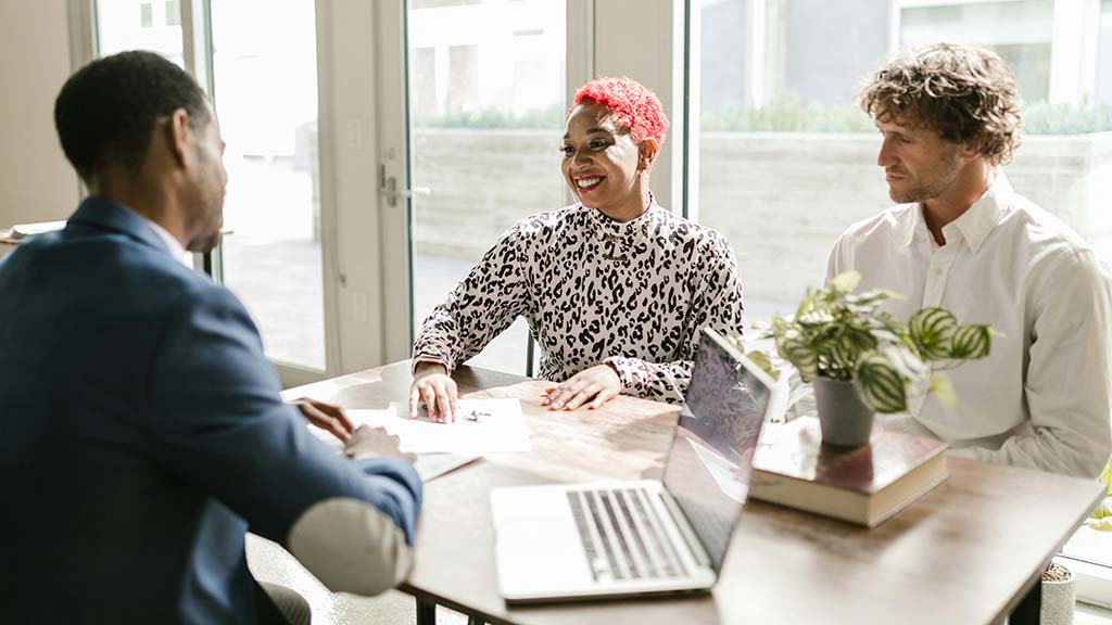 Attorney meeting with his clients